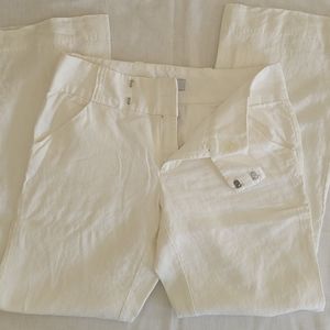 Wide bootcut linen white pants.